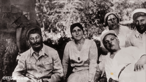 Group Of People Including Man In White Hat GIF