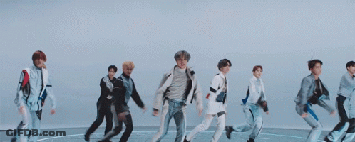 Group Of People Jumping In Circle GIF