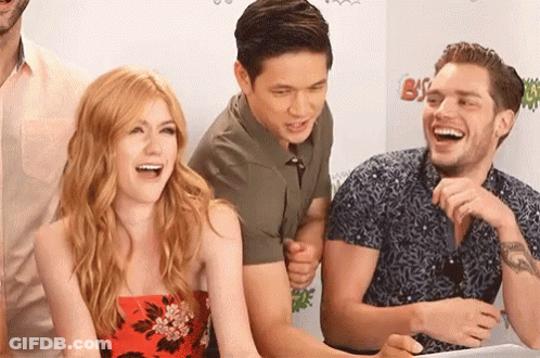 Group Of People Laughing Together GIF
