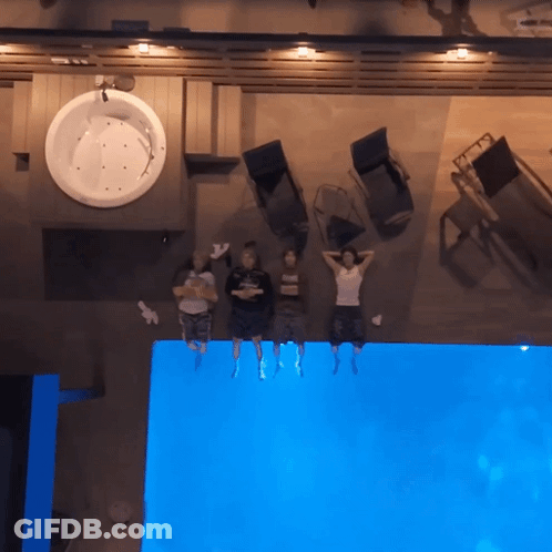 Group Of People Laying On Pool Edge GIF