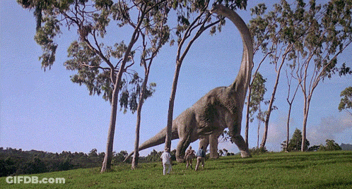 Group Of People Looking At Giant Dinosaur GIF