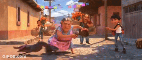Group Of People On A Cobblestone Street GIF