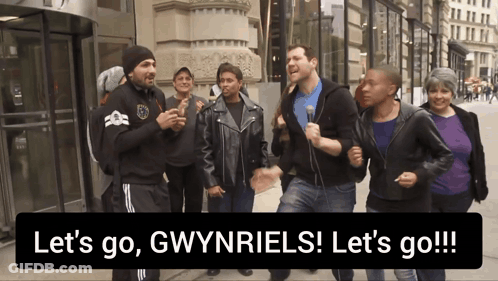Group Of People On Sidewalk Saying Let's Go Gwynriels GIF
