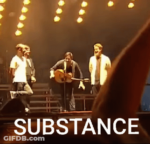 Group Of People On Stage With Substance GIF