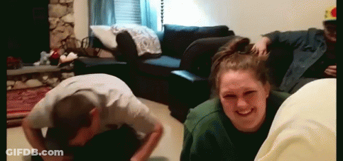 Group Of People Playing In Living Room GIF