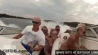 Group Of People Riding Boat GIF