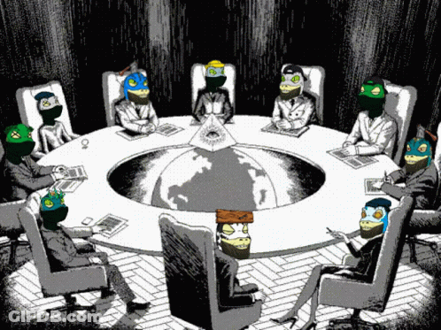 Group Of People Sitting Around Table With Masks GIF