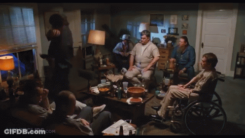Group Of People Sitting Around Table With Movieclips.com GIF