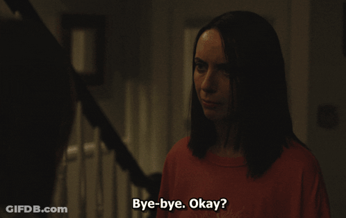 Group Of People Sitting At Table Saying Bye-B-- GIF