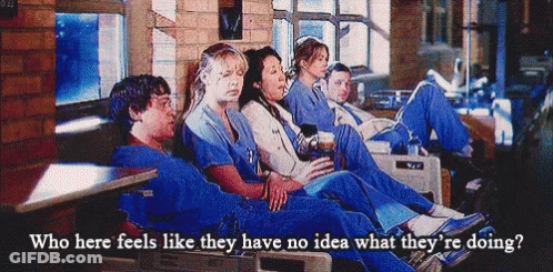 Group Of People Sitting In A Row GIF
