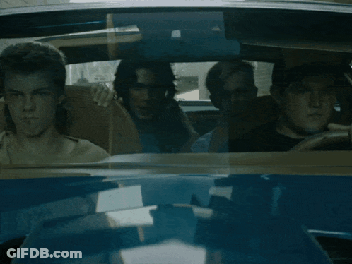 Group Of People Sitting In Car With Rear View Mirror GIF