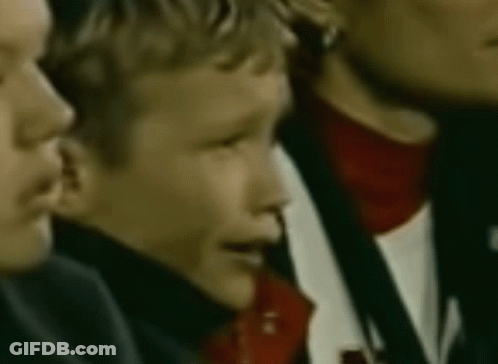 Group Of People Sitting In Stadium Watching Game GIF