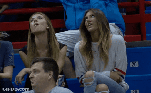 Group Of People Sitting In Stadium With Number 20 GIF