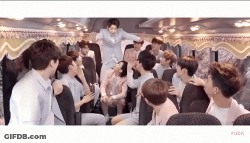 Group Of People Sitting On Bus Talking GIF