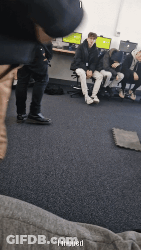 Group Of People Sitting With I Tripped GIF