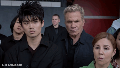 Group Of People Standing In A Line GIF