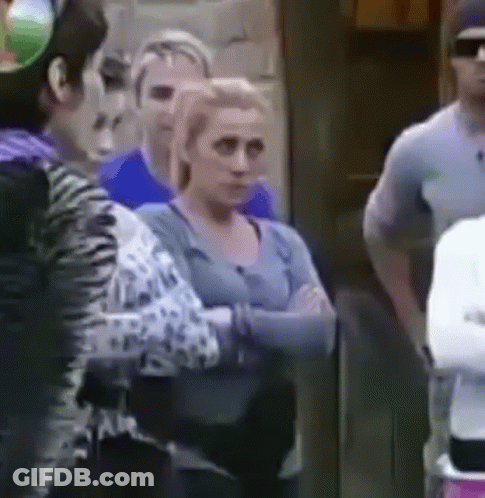 Group Of People Standing In A Line GIF
