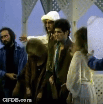 Group Of People Standing In A Room GIF