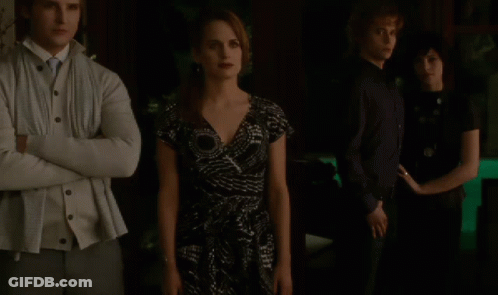 Group Of People Standing In Dark Room GIF
