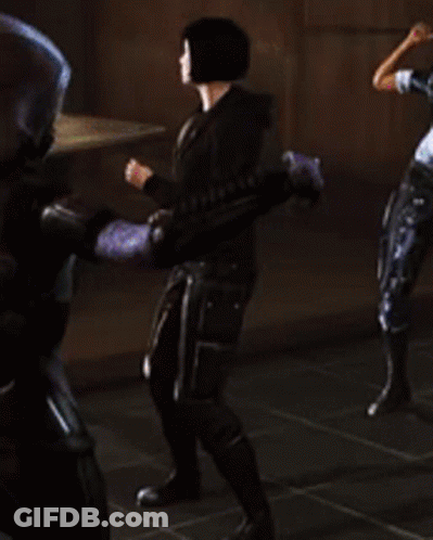 Group Of People Standing In Dark Room GIF