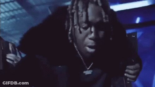 Group Of People Standing In Dark Room GIF