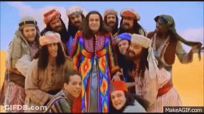 Group Of People Standing In Desert GIF