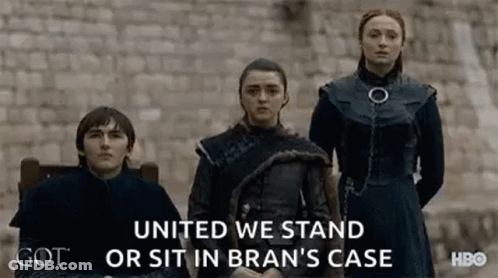 Group Of People Standing In Front Of Brick Wall GIF