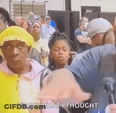 Group Of People Standing In Line Talking GIF