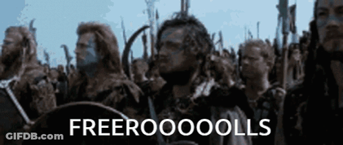Group Of People Standing In Line With Words Freerooooolls GIF
