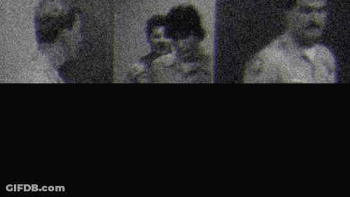Group Of People Standing In Room GIF