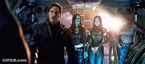 Group Of People Standing In Room GIF