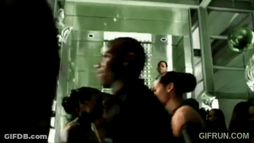 Group Of People Standing In Room With Gifrun.com GIF
