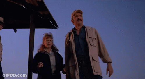 Group Of People Standing Under Roof Looking Up GIF