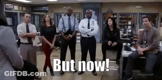 Group Of People Standing With But Now GIF