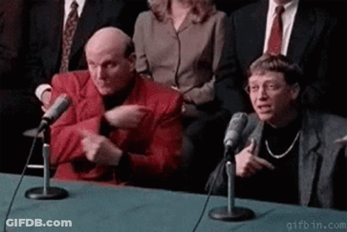 Group Of People Talking Into Microphones At Table GIF