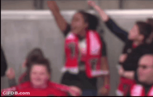 Group Of People With Arms In Air GIF