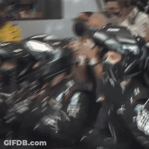 Group Of People With Helmet Saying Boston Eagle GIF