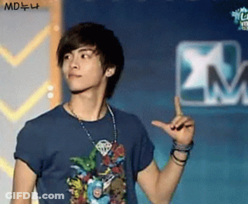 Group Of People With One Person Wearing Letter O GIF