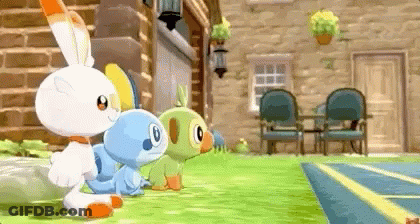 Group Of Pokemon In Front Of Brick Building GIF