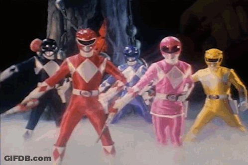 Group Of Power Rangers Standing In A Line GIF