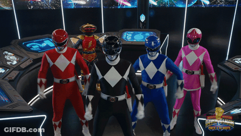 Group Of Power Rangers Standing In Room GIF