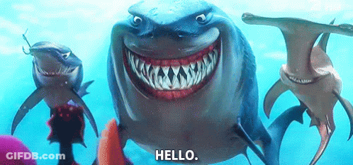 Group Of Sharks Swimming One Smiling Saying Hello GIF