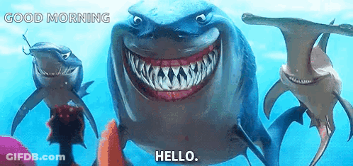 Group Of Sharks Swimming One Smiling Says Hello GIF