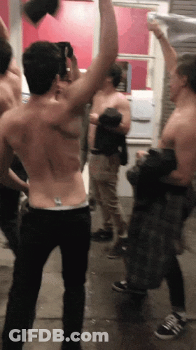 Group Of Shirtless Men Standing GIF