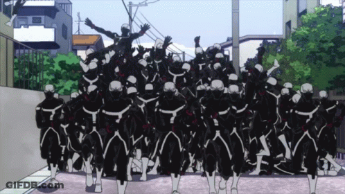 Group Of Skeletons Walking Down Street GIF