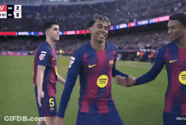 Group Of Soccer Players Celebrating Goal With Number 5 GIF