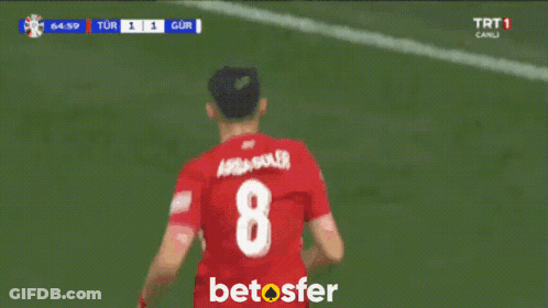 Group Of Soccer Players On Field With Betosfer Logo GIF