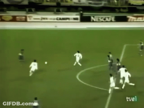 Group Of Soccer Players On Field With Nescafe Ad GIF