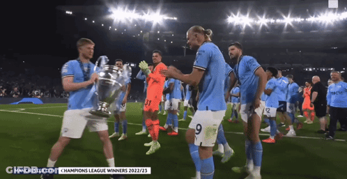 Group Of Soccer Players Running On Field GIF