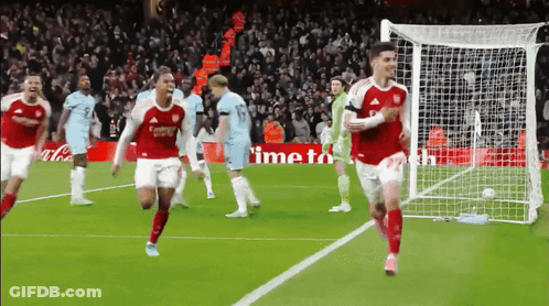Group Of Soccer Players With Coca Cola Ad GIF